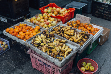 Bananas, oranges and apple for sell at morning market in George Town. Penang, 