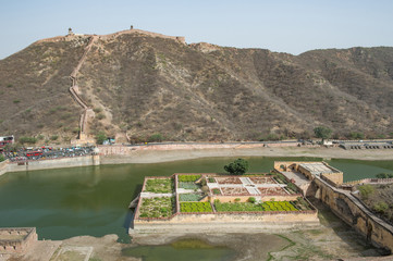 Amber fort gardens on Maota Lake, Jaipur, India. Amber Fort is the main tourist attraction in the Jaipur area. - 148480054
