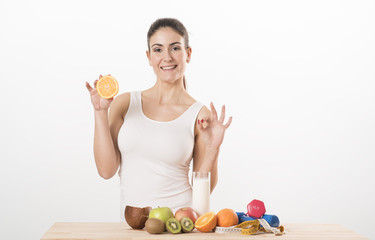 Young healthy woman with fruits