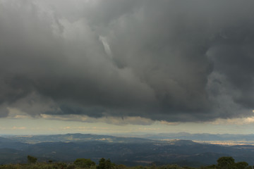 Huge storm clouds cover the whole valley.