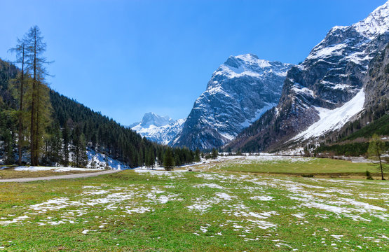 Spring mountain landscape with patches of melting snow. Austria, Tyrol, Karwendel Alpine Park