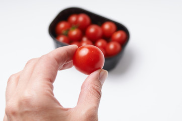 cherry tomatoes on a white background