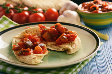 Pita bread with vegetable spread- mediterranean kitchen style.