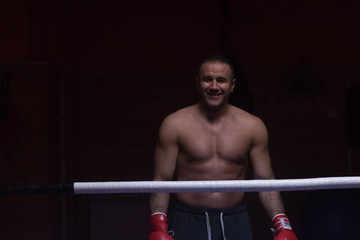 portrait of muscular professional kickboxer