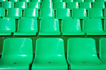 Fototapeta premium Empty green seats in stadium