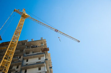 Naklejka premium Construction of multi-storey residential building