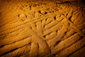 Tire tracks on the sand