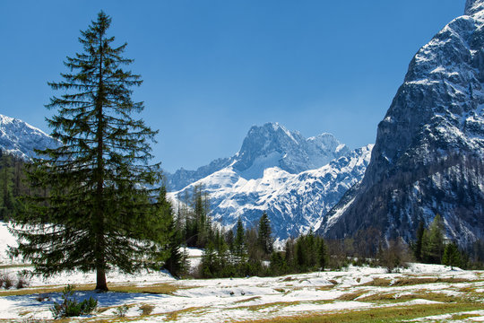 Majestic mountain landscape in the early springtime. Snow melting in the Alps, Austria, Tyrol
