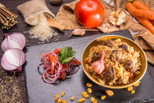 Pilaf, with meat of a lamb, rice and spices, with carrots and onions
