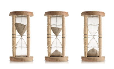 Set of vintage hourglasses isolated on white background