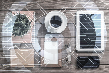 Business workplace with tablet pc and security concept on screen