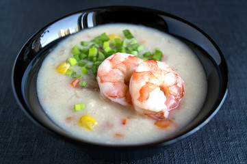 soup with sea food on black background