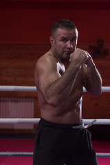 professional kickboxer in the training ring