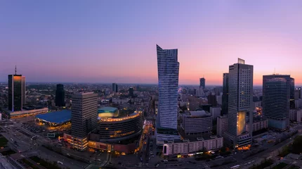 Foto op Plexiglas Panorama of Warsaw city with modern skyscraper after sunset © velishchuk