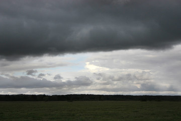 Obraz na płótnie Canvas Before the rain. Fields and meadows. Countryside.