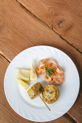 Mediterranean dish of shrimps with corn cobs. Dish of fresh, ecological clean products