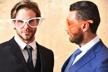 happy and serious bearded men with funny summer eyeglasses