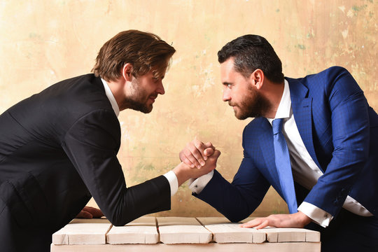 Business partners compete with each other