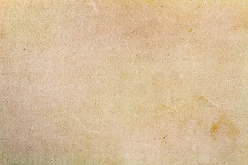 Beige textile texture with dirty spots. Abstract background