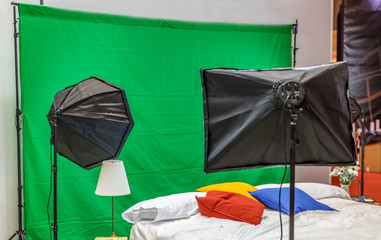 Photo studio with a bed, ready for a photgraphy session