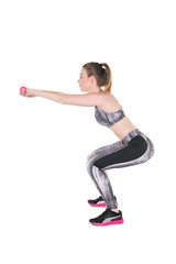 Young girl lifting weights