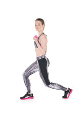 Young girl lifting weights