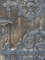 Wrought iron and door handle in form of a dog in Jihlava, Czechia