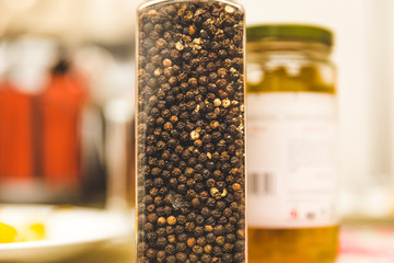 Peppercorns in a Grinder