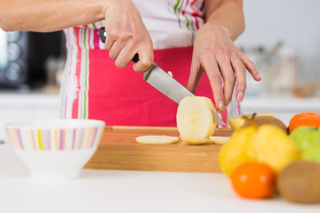 mother preparing healthy apple tart