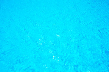 Blue sea surface with waves