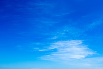 Obraz na płótnie Canvas Blue sky background with tiny clouds