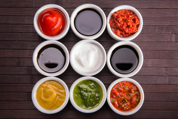 Soy sauce, balsam sauce, pomegranate sauce, ketchup, sour cream, mustard, basil