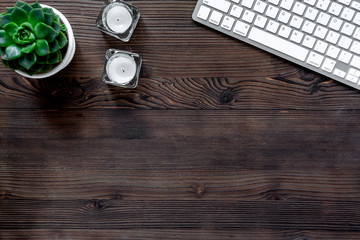 female desktop with keyboard and flowers wooden background top view mock up