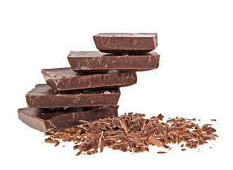 Chocolate bars and chocolate chips on a white background