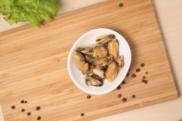 Mussels in oil on a plate