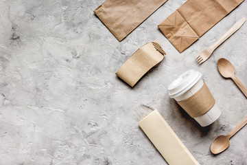paper bags and plastic cup for take away set top view space for text