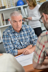 gloomy man in the office