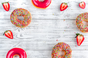 lunch with donuts on wooden table background top view mock up