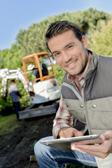 worker on tablet