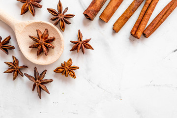 Cooking with spices, vanilla, cinnamon on kitchen table background top view mock-up