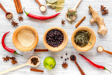 Flat lay herb and spices on rustic kitchen background