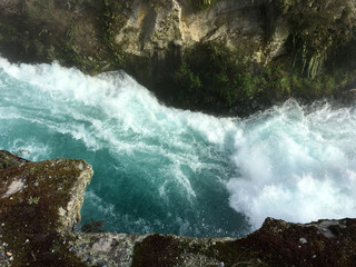 Wild rushing stream of Huka Falls New Zealand