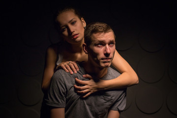 Passionate young couple in the room