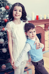 Children around the Christmas tree.