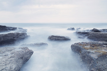Serene seascape in Azkorri beach, Biscay, Basque Country, Spain. Long exposure shot.