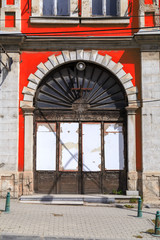 Old obsolete arch wooden door