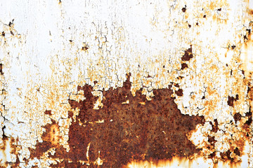 Rusty metal texture with cracked white paint