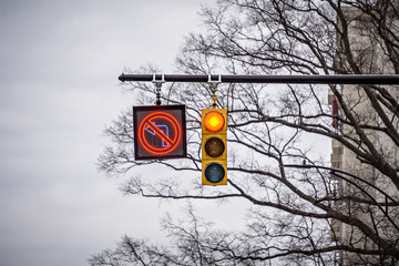 red street light and stop and no turn sign