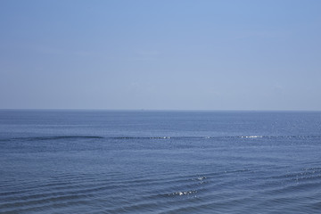 Blue sea and blue sky background