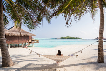 Relaxing view of Turquoise Waters in a Hammock